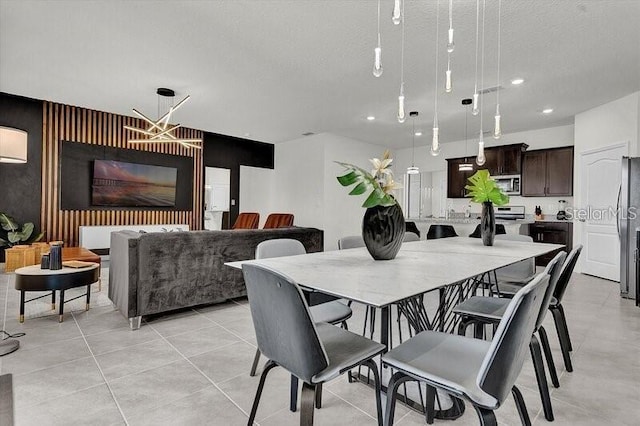 7622 Oakmoss Loop, Davenport, FL 33837 - dining space featuring recessed lighting and an accent wall