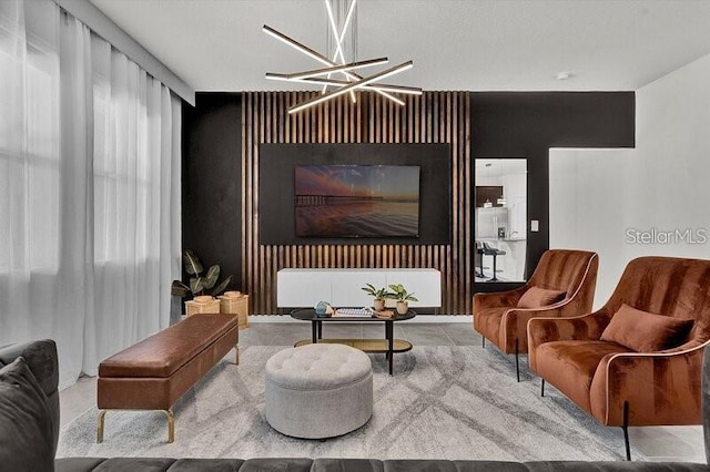 7622 Oakmoss Loop, Davenport, FL 33837 - sitting room featuring a chandelier and an accent wall