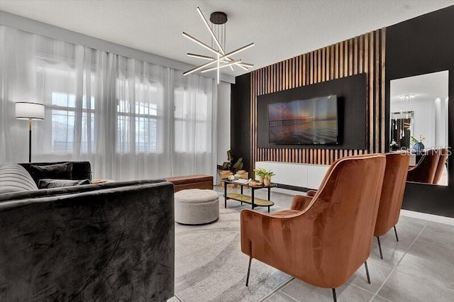 7622 Oakmoss Loop, Davenport, FL 33837 - tiled living area featuring an accent wall, a chandelier, and baseboards