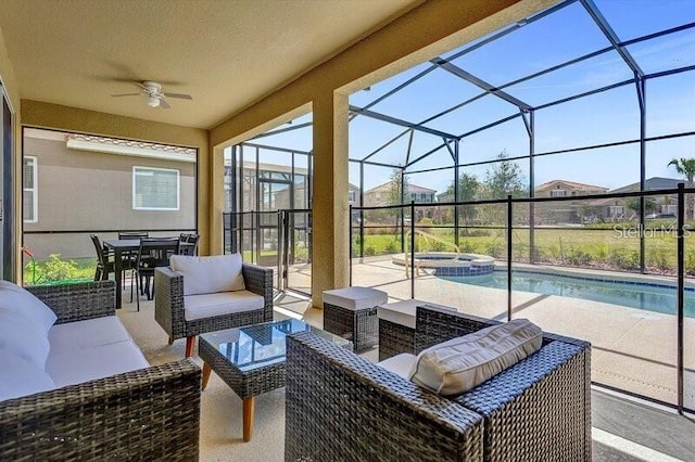 7622 Oakmoss Loop, Davenport, FL 33837 - view of patio with outdoor lounge area, a ceiling fan, a pool with connected hot tub, outdoor dining area, and glass enclosure