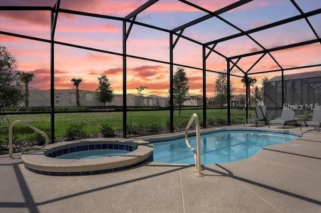 7622 Oakmoss Loop, Davenport, FL 33837 - view of pool with a patio, a pool with connected hot tub, a lawn, and a lanai