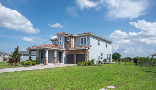 15600 Vetta Dr, Bella Collina, FL 34756 - mediterranean / spanish home featuring stone siding, an attached garage, stucco siding, driveway, and a tiled roof