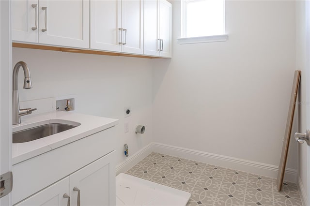 15600 Vetta Dr, Bella Collina, FL 34756 - laundry room featuring cabinet space, washer hookup, and hookup for an electric dryer
