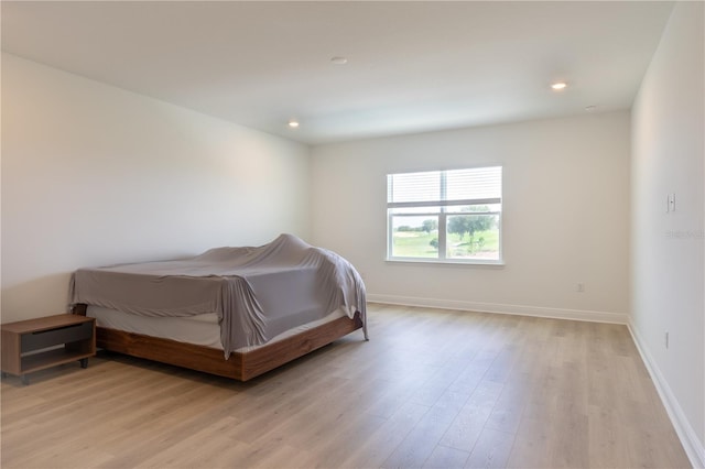 15600 Vetta Dr, Bella Collina, FL 34756 - bedroom with light wood-type flooring and recessed lighting