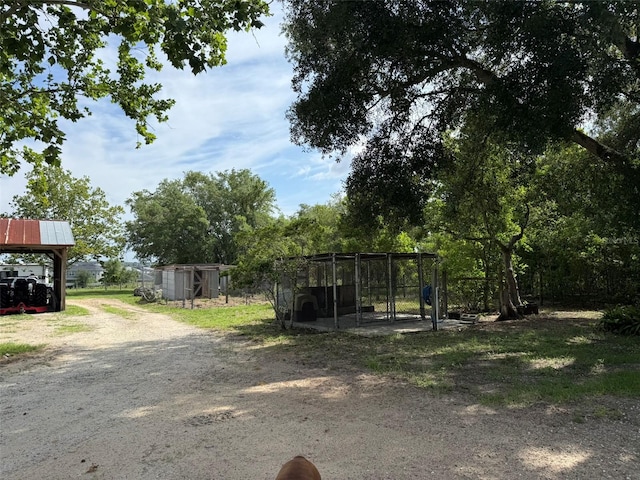 15311 Johns Lake Rd, Clermont, FL 34711 - view of yard with an outbuilding and exterior structure