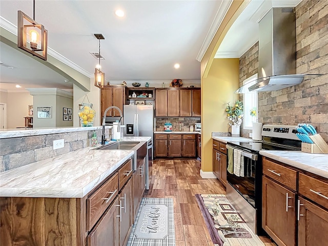 15311 Johns Lake Rd, Clermont, FL 34711 - kitchen featuring stainless steel appliances, wall chimney range hood, crown molding, open shelves, and tasteful backsplash