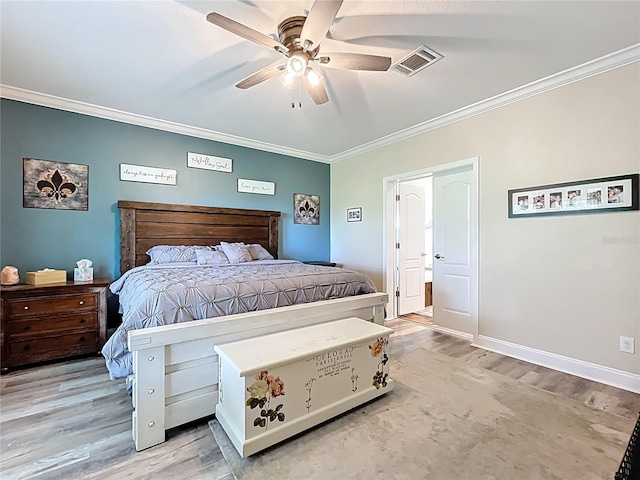 15311 Johns Lake Rd, Clermont, FL 34711 - bedroom with ornamental molding, light wood finished floors, a ceiling fan, and baseboards
