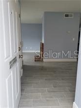 5144 Picadilly Circus Ct Unit 2, Orlando, FL 32839 - hallway with baseboards