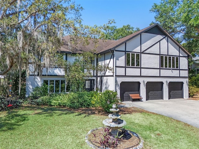 11951 Elbert St, Clermont, FL 34711 - view of front of house featuring stucco siding, a garage, a front yard, concrete driveway, and brick siding