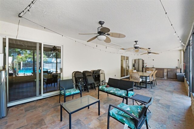 11951 Elbert St, Clermont, FL 34711 - view of patio featuring a ceiling fan, an outdoor hangout area, and outdoor dining space