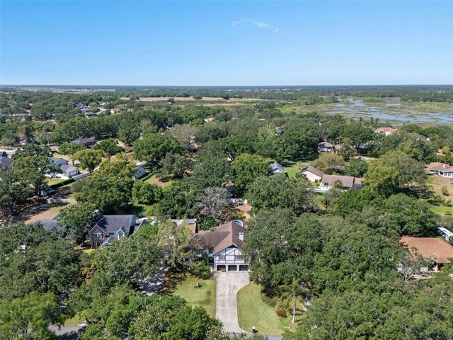 11951 Elbert St, Clermont, FL 34711 - aerial view of property and surrounding area with nearby suburban area