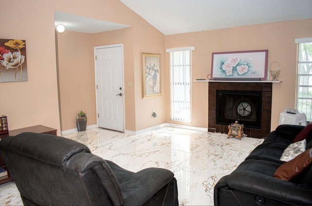 7410 Orange Crest Cir, Lakeland, FL 33810 - living room with marble tiled flooring, lofted ceiling, baseboards, and a brick fireplace