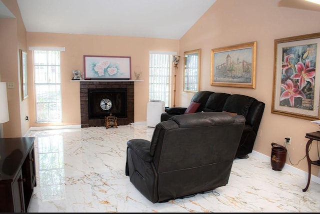 7410 Orange Crest Cir, Lakeland, FL 33810 - living area with marble tiled flooring, a brick fireplace, baseboards, and vaulted ceiling