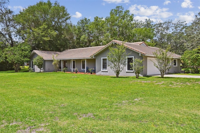 16 Pine Forest Dr, Haines City, FL 33844 - single story home with a garage, stucco siding, driveway, a front lawn, and a tiled roof