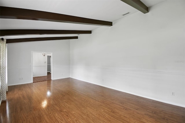 16 Pine Forest Dr, Haines City, FL 33844 - empty room featuring wood finished floors and a chandelier