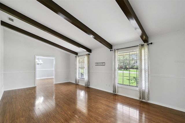 16 Pine Forest Dr, Haines City, FL 33844 - unfurnished living room featuring a chandelier and wood finished floors