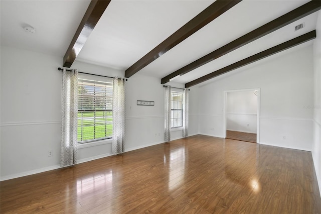 16 Pine Forest Dr, Haines City, FL 33844 - unfurnished living room with wood finished floors and baseboards