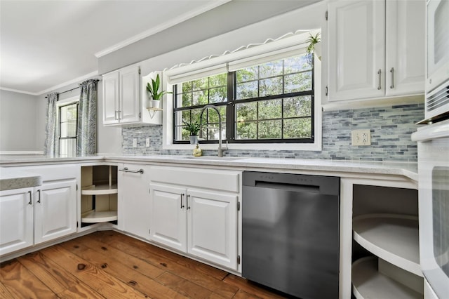 16 Pine Forest Dr, Haines City, FL 33844 - kitchen with stainless steel dishwasher, crown molding, open shelves, white cabinets, and dark wood-style floors