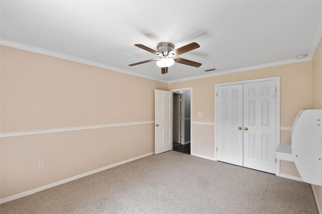 16 Pine Forest Dr, Haines City, FL 33844 - unfurnished bedroom with carpet floors, a closet, crown molding, and ceiling fan