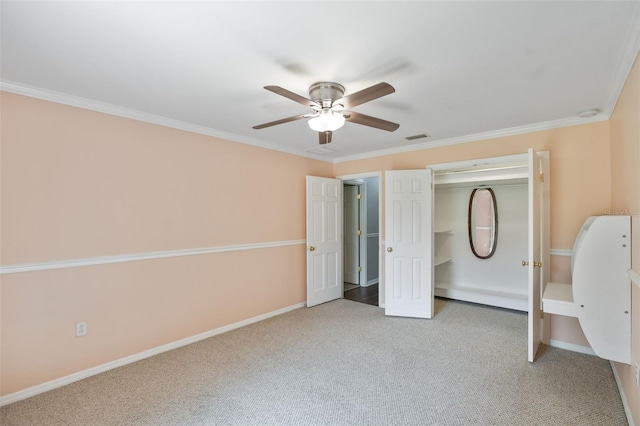 16 Pine Forest Dr, Haines City, FL 33844 - unfurnished bedroom featuring light colored carpet, ornamental molding, ceiling fan, and a closet