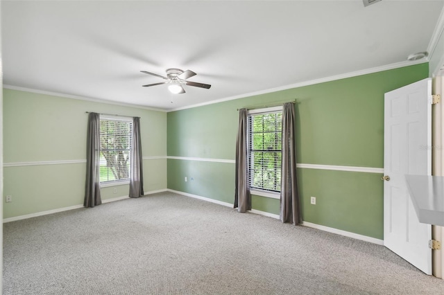 16 Pine Forest Dr, Haines City, FL 33844 - unfurnished room with a ceiling fan, crown molding, carpet flooring, and a smoke detector