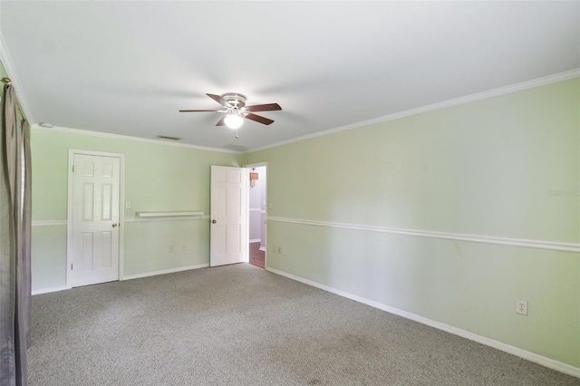 16 Pine Forest Dr, Haines City, FL 33844 - unfurnished bedroom with carpet, crown molding, a ceiling fan, and a closet
