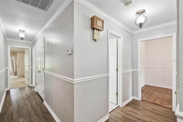 16 Pine Forest Dr, Haines City, FL 33844 - corridor with wood finished floors and crown molding