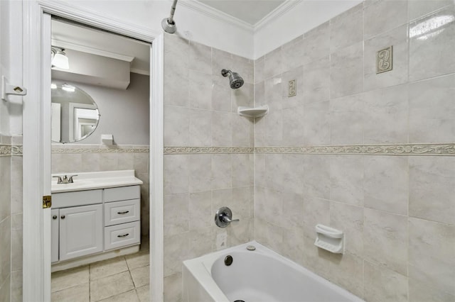 16 Pine Forest Dr, Haines City, FL 33844 - full bath featuring crown molding, tile walls, vanity, bathing tub / shower combination, and tile patterned floors