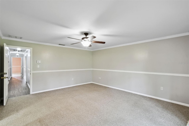16 Pine Forest Dr, Haines City, FL 33844 - spare room with ceiling fan, attic access, carpet, and crown molding