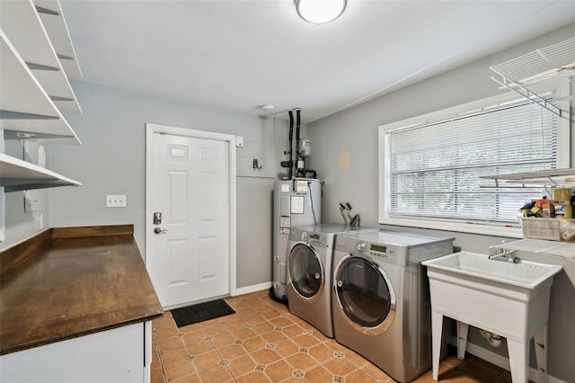 16 Pine Forest Dr, Haines City, FL 33844 - washroom featuring water heater and washing machine and dryer