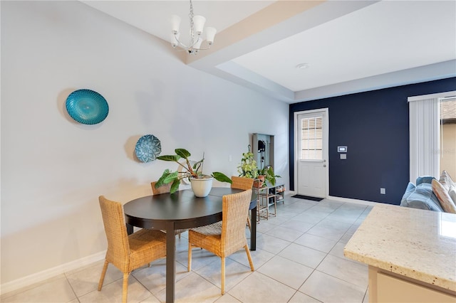 5103 Jones Rd, Saint Cloud, FL 34771 - dining area featuring a chandelier, light tile patterned floors, and plenty of natural light