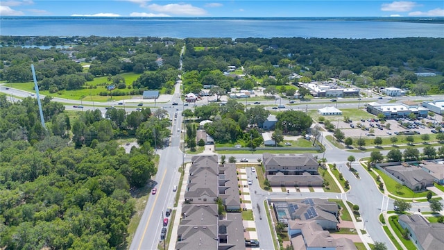 5103 Jones Rd, Saint Cloud, FL 34771 - aerial view of property and surrounding area featuring a nearby body of water and nearby suburban area
