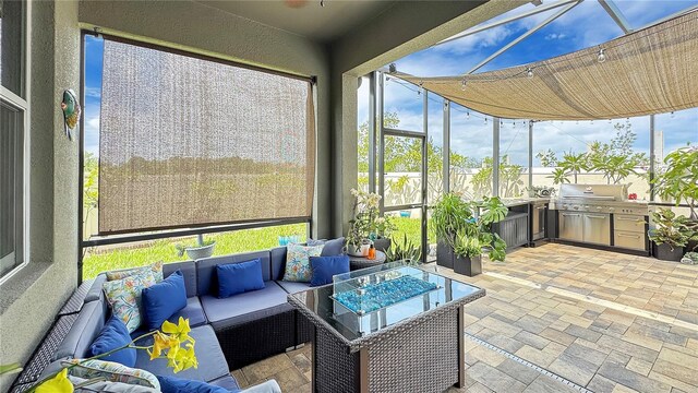 148 Whirlaway Dr, Davenport, FL 33837 - sunroom / solarium featuring an outdoor living space and exterior kitchen
