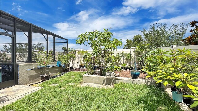 148 Whirlaway Dr, Davenport, FL 33837 - fenced backyard featuring glass enclosure