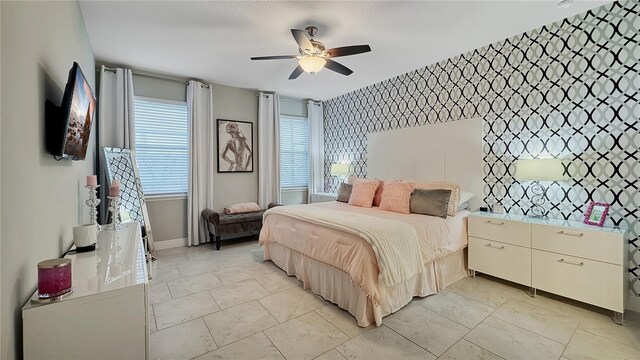 148 Whirlaway Dr, Davenport, FL 33837 - bedroom featuring an accent wall and ceiling fan