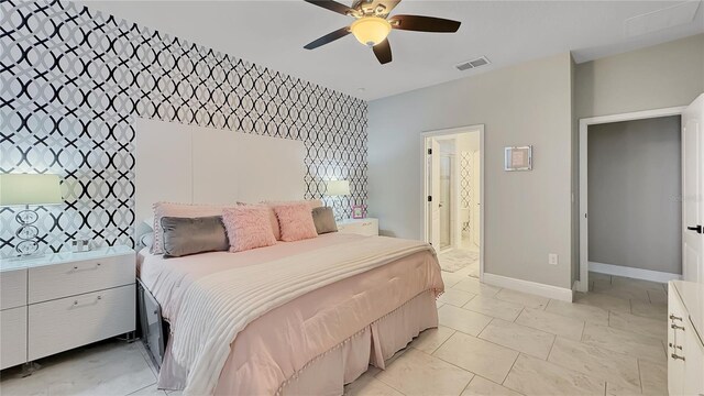 148 Whirlaway Dr, Davenport, FL 33837 - bedroom featuring a ceiling fan and ensuite bathroom
