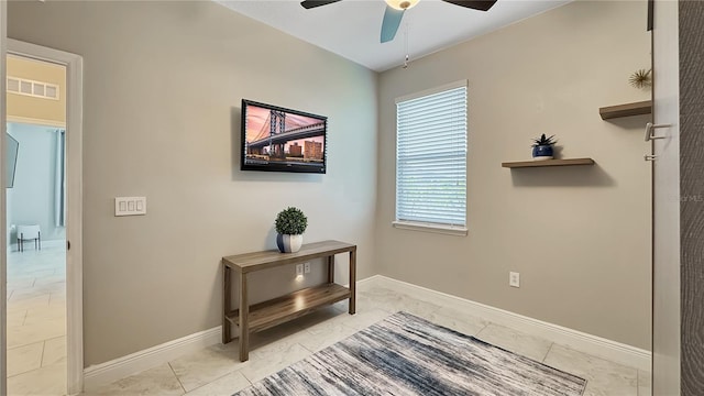 148 Whirlaway Dr, Davenport, FL 33837 - hall with light marble finish floors and plenty of natural light
