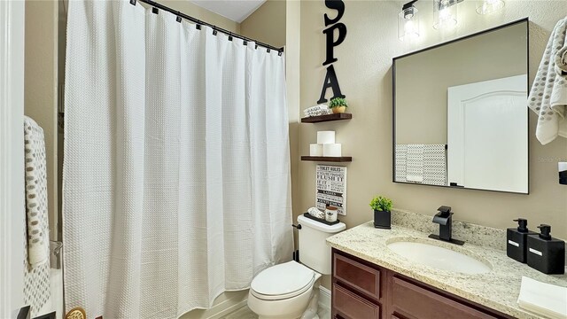 148 Whirlaway Dr, Davenport, FL 33837 - full bathroom with vanity and shower / tub combo with curtain