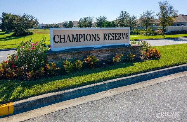 148 Whirlaway Dr, Davenport, FL 33837 - community / neighborhood sign featuring a yard