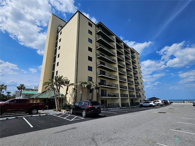 3647 S Atlantic Ave Unit 3C, Daytona Beach, FL 32118 - view of property featuring uncovered parking