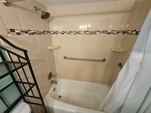 3647 S Atlantic Ave Unit 3C, Daytona Beach, FL 32118 - bathroom featuring shower / bath combo with shower curtain and toilet