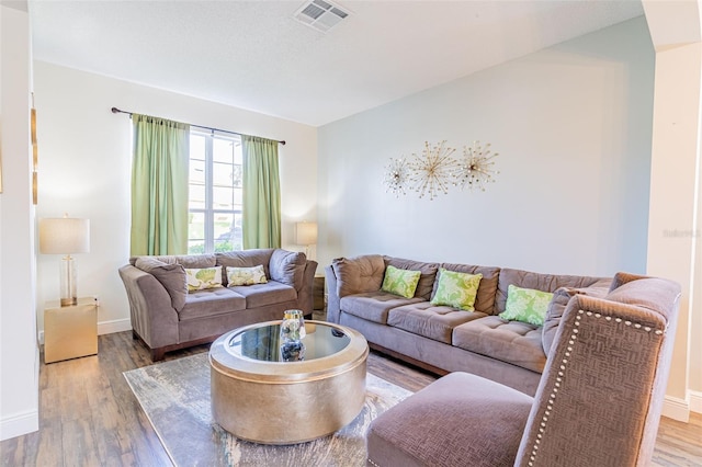 8491 Oasis Key Cv, Kissimmee, FL 34747 - living room with wood finished floors and baseboards
