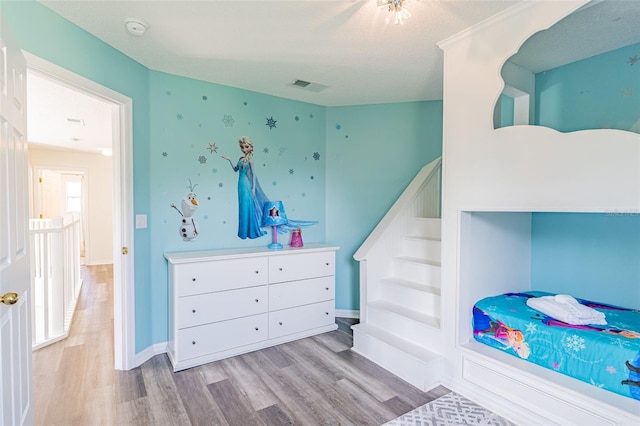 8491 Oasis Key Cv, Kissimmee, FL 34747 - bedroom with wood finished floors and baseboards