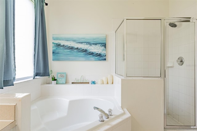 8491 Oasis Key Cv, Kissimmee, FL 34747 - bathroom featuring a shower stall and a garden tub