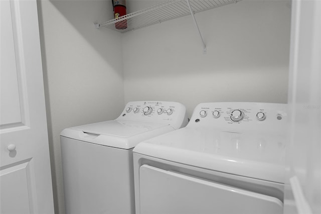 1565 Plunker Dr, Davenport, FL 33896 - laundry room with washing machine and dryer