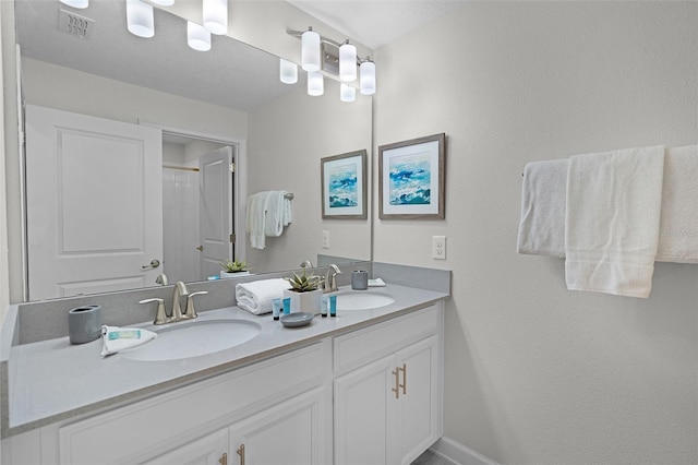 1565 Plunker Dr, Davenport, FL 33896 - full bath with double vanity and a shower