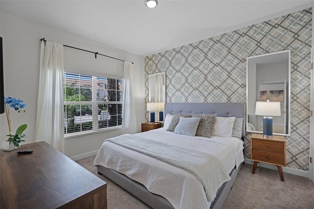 1565 Plunker Dr, Davenport, FL 33896 - bedroom with wallpapered walls, baseboards, carpet flooring, and an accent wall