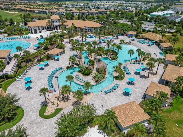 1565 Plunker Dr, Davenport, FL 33896 - aerial perspective of suburban area featuring a pool
