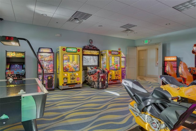1565 Plunker Dr, Davenport, FL 33896 - playroom featuring carpet floors and a drop ceiling