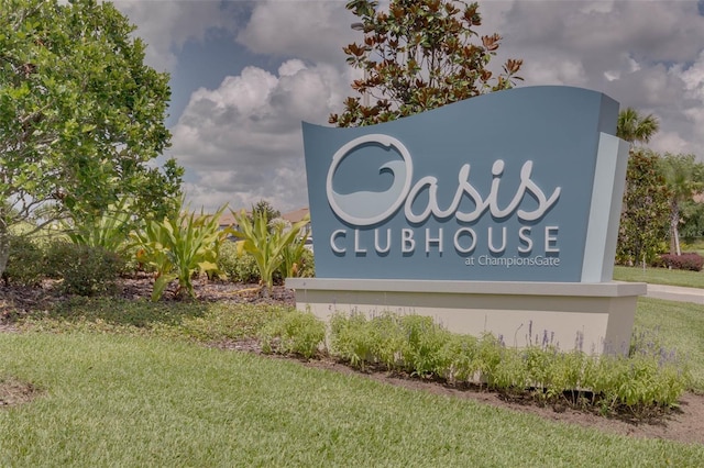 1565 Plunker Dr, Davenport, FL 33896 - community / neighborhood sign with a lawn